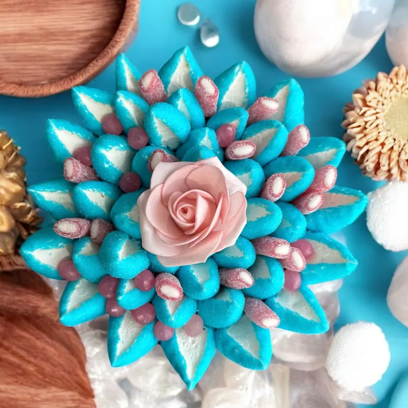 Bouquet de bonbons turquoise à la rose rose